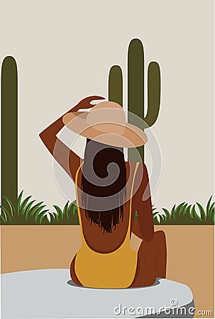 brunette girl in a hat sunbathes in the open air around the vegetation and cacti Stock Photo